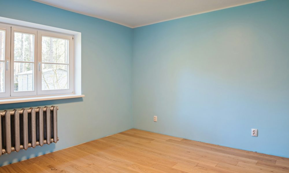 New home construction interior room with wooden floors